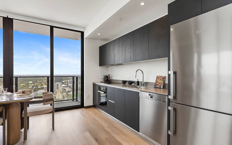 floor-to-ceiling windows with city views in kitchen
