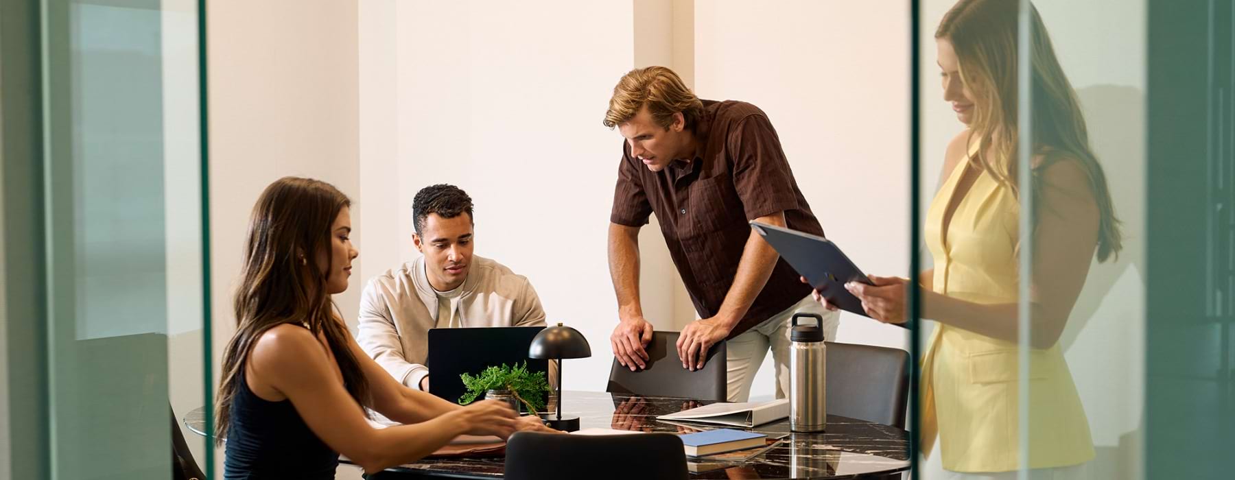 people working in a meeting room